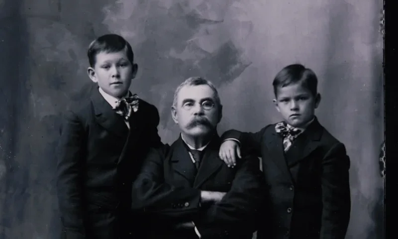 Archival photo of Peter Lee and two sons.